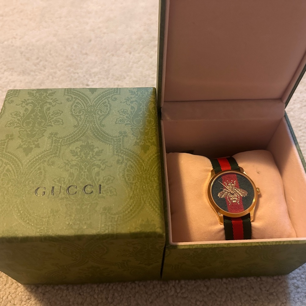 Gucci Gold and green Luxury Watch